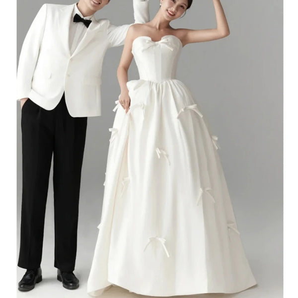 Elegant Satin Strapless A-Line Wedding Dress with Sweet Bow Detail